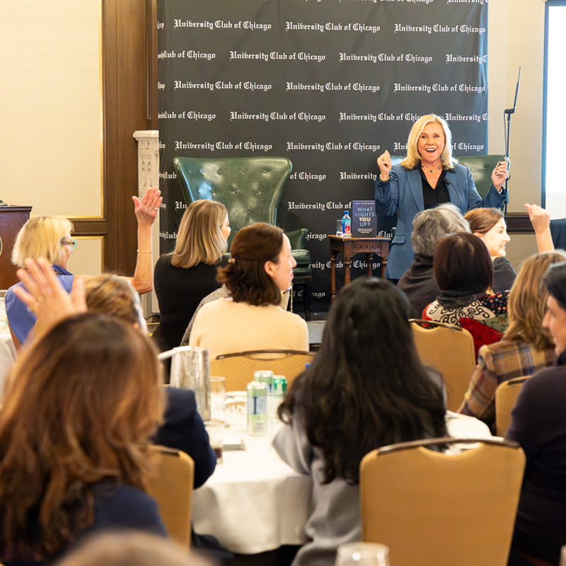 audience Mary Olson-Menzel speaking at a live event at the University of Chicago